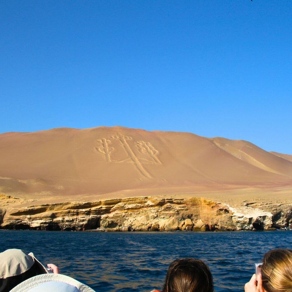 The mysterious Candelabra geoglyph overlooking the Pacific Ocean near Paracas and the Ballestas Islands.