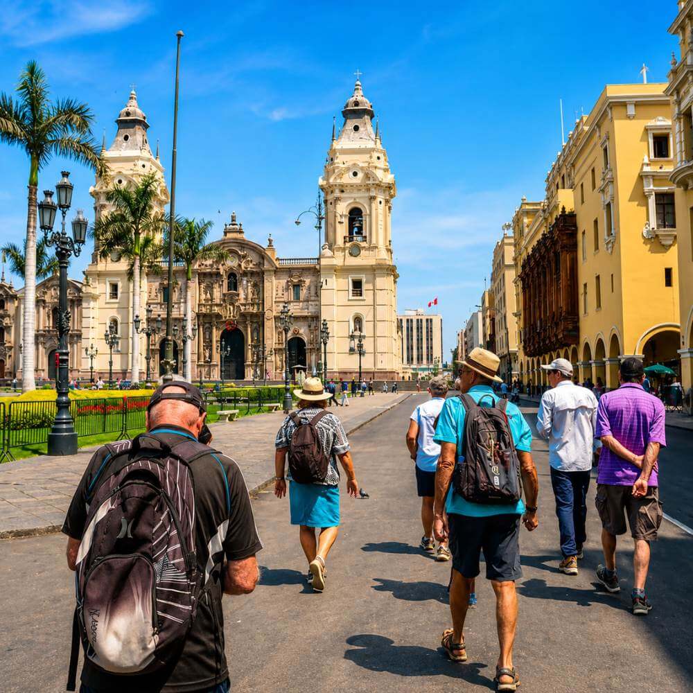 Travelers exploring Plaza Mayor and Lima Cathedral during a guided City Tour of Lima, Peru.
