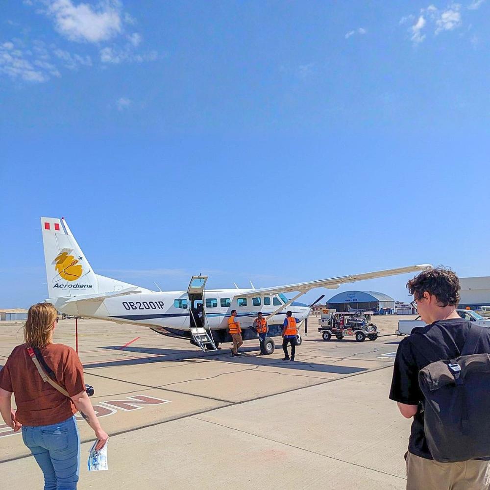 Tourists boarding a Cessna aircraft for the Nazca Lines flight tour in Peru from Lima