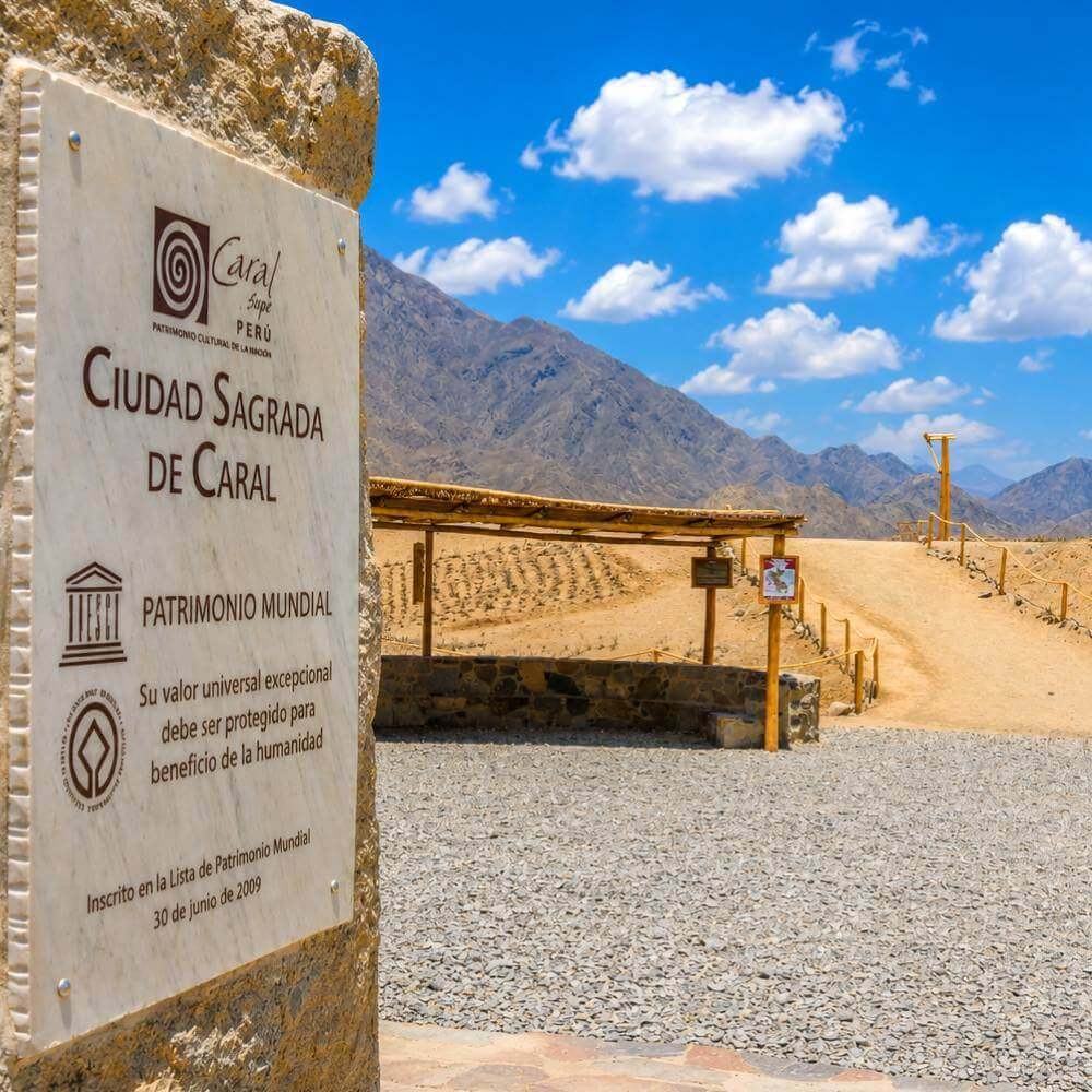 Entrance sign of the Sacred City of Caral UNESCO World Heritage Site during the Tour to Caral from Lima, Peru.