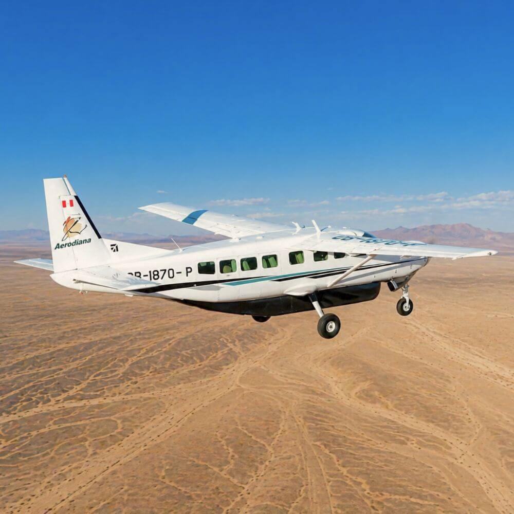 Highlight Image 1, Scenic Flight Over the Nazca Desert ALT Text: Aerodiana sightseeing aircraft flying above the Nazca Desert during a Nazca Lines flight experience in Peru. Short Description: Take to the skies aboard a comfortable aircraft and enjoy breathtaking aerial views of the mysterious Nazca Desert and its world-famous geoglyphs. Highlight Image 2, The Astronaut Geoglyph ALT Text: Aerial view of the Astronaut geoglyph carved into a hillside in the Nazca Desert, Peru. Short Description: Discover the enigmatic Astronaut, one of the most intriguing figures among the Nazca Lines and a symbol of the mysteries that continue to fascinate researchers. Highlight Image 3, Spectacular Landscapes of Paracas Bay ALT Text: Panoramic view of Paracas Bay featuring turquoise waters, desert cliffs, and dramatic coastal scenery in Peru. Short Description: Experience the unique beauty of Paracas Bay, where golden desert landscapes meet the crystal-clear waters of the Pacific Ocean. Highlight Image 4, Red Beach in Paracas National Reserve ALT Text: Red Beach in Paracas National Reserve with colorful sands, ocean waves, and dramatic desert coastline. Short Description: Visit the famous Red Beach, one of Peru's most spectacular coastal attractions, renowned for its striking colors and extraordinary natural beauty.