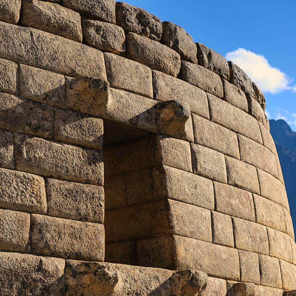 The Temple of the Sun at Machu Picchu showcasing remarkable Inca stonework and astronomical architecture in Peru.