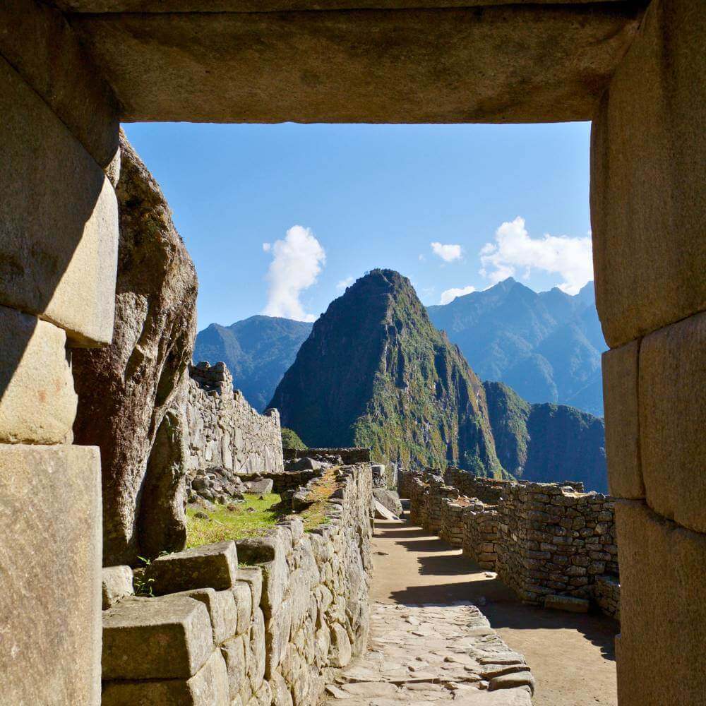 Ancient stone gateway overlooking Machu Picchu, one of the New Seven Wonders of the World