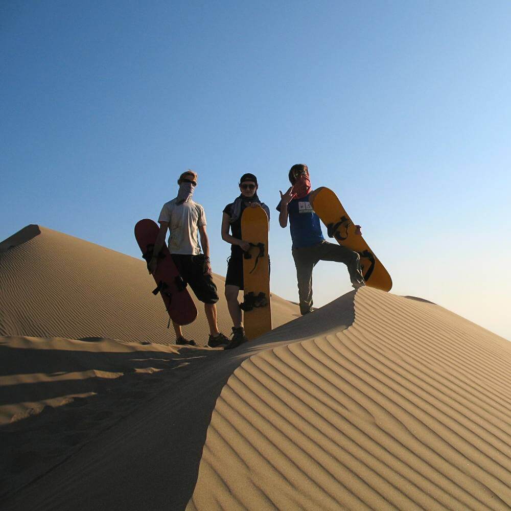 Sandboarding Tour on Cerro Blanco with sunrise.