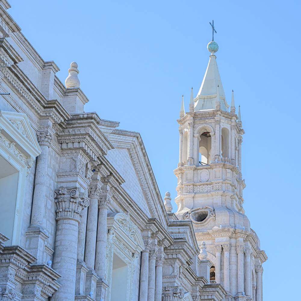 Close-up view of the historic Arequipa Cathedral built from white volcanic sillar stone in Peru's UNESCO-listed White City.