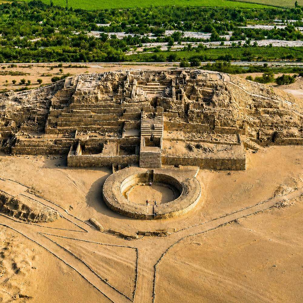 Aerial view of the Great Pyramid and sunken circular plaza at the Caral Archaeological Site, the oldest known civilization in the Americas, located in Peru's Supe Valley.