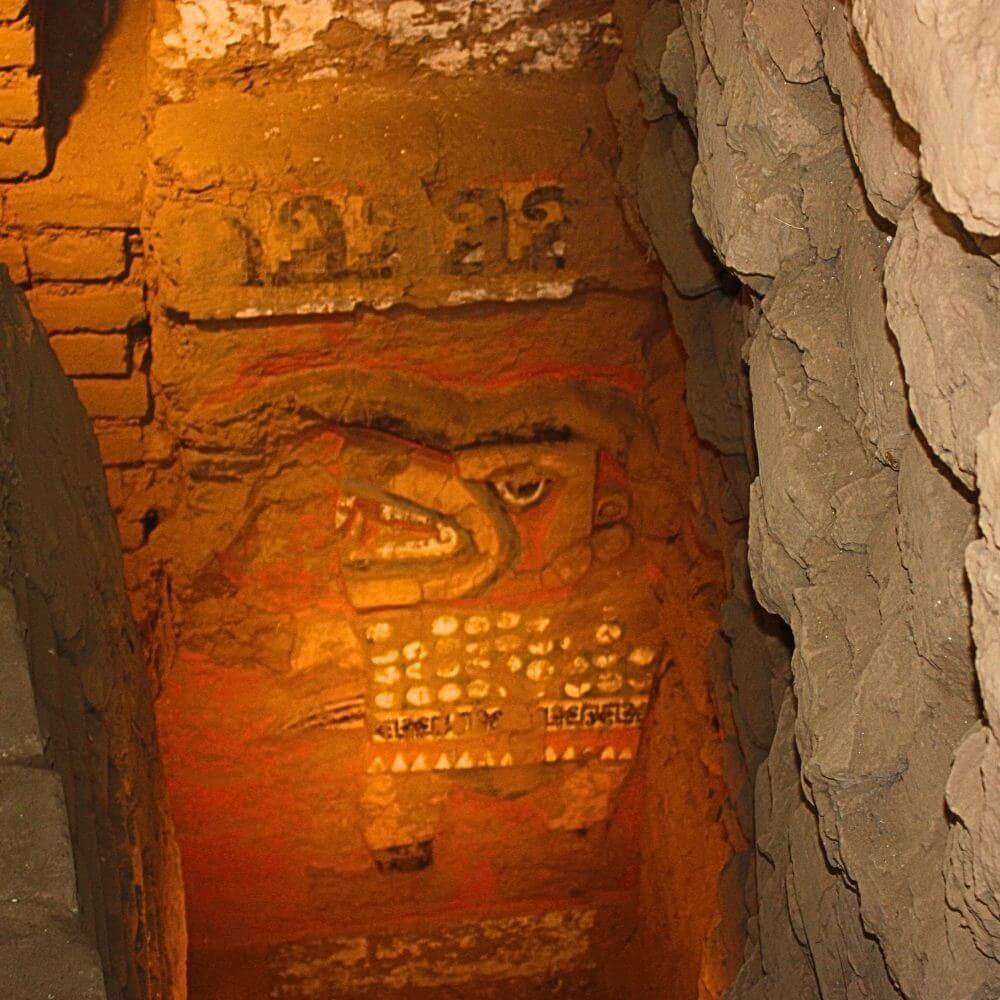 Ancient mural of the Moche deity Ai Apaec preserved inside Huaca de la Luna archaeological complex in northern Peru.