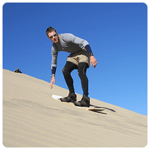Sandboarding in Huacachina dunes.
