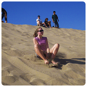 Sandboarding in Huacachina desert.