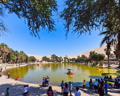 Visit Huacachina, a stunning desert oasis near Ica.