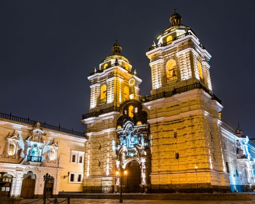 Lima’s colonial center illuminated at night, historic beauty shines.