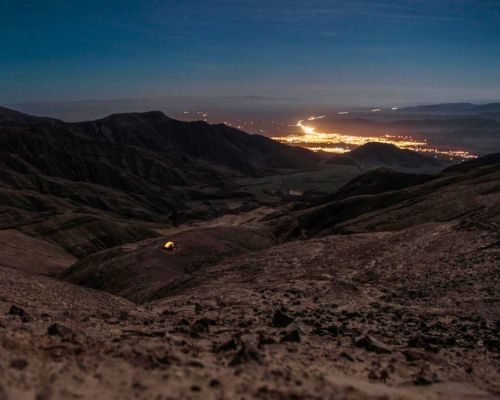 Watch the desert awaken from Cerro Blanco’s peak.