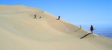Exploring the dune of Cerro Blanco in Nazca.