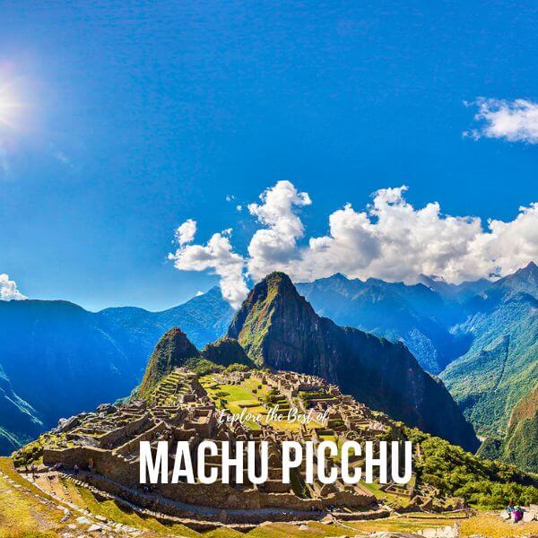 Machu Picchu, the ancient Inca citadel perched high in the Andes, with terraced fields and temple structures.