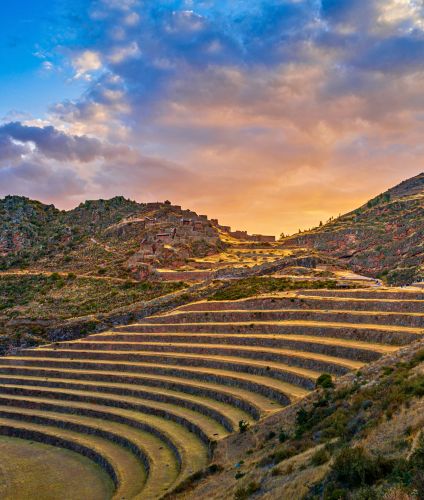Inca terraces of Pisaq in the Sacred Valley, ancient farming site on the Mystic Peru tour.