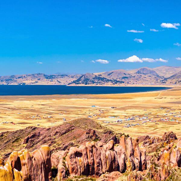 Scenic road from Puno to Amaru Muru with Lake Titicaca.