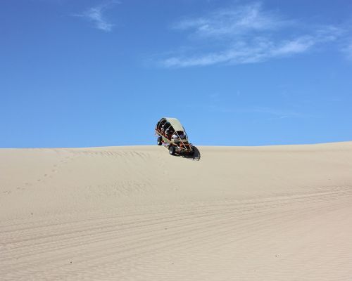 Dune buggy riding over Paracas sand dunes