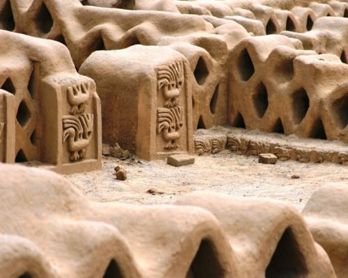 Detailed friezes and motifs in Chan Chan ruins