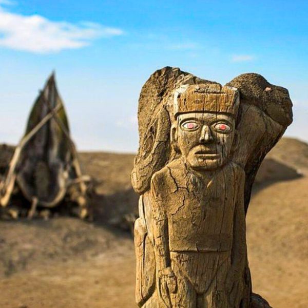 Wooden Moche idol with glowing eyes near El Brujo Complex