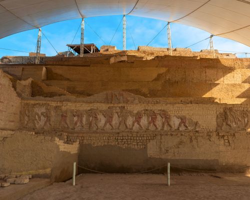 Friezes at Huaca Cao Viejo under protective canopy