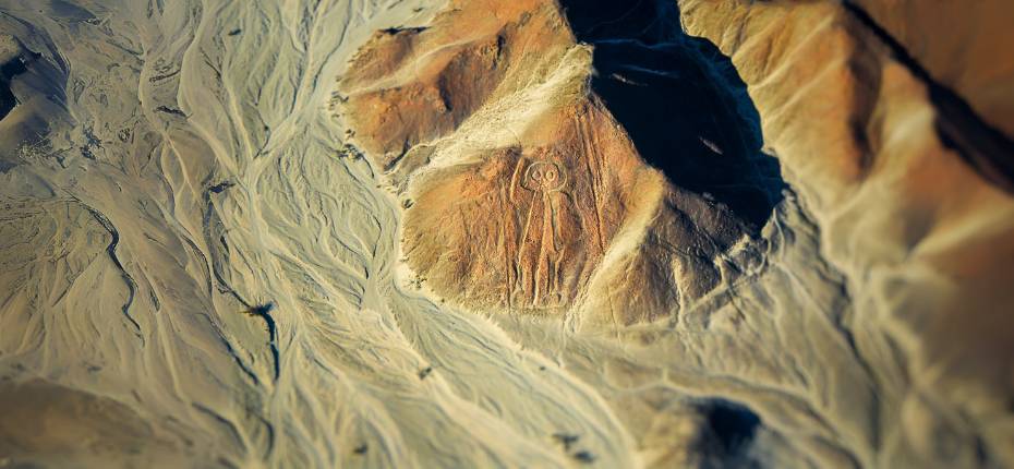 The Astronaut geoglyph carved into a hillside in the Nazca Desert
