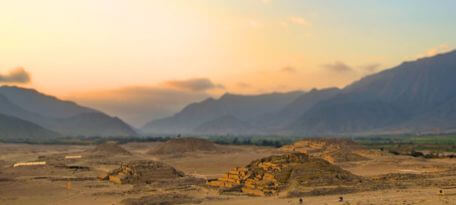 Sacred City of Caral seen at sunset with the Andes in the background