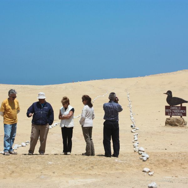 Local guide explaining about the Paracas desert.