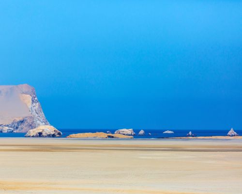 Expansive view of the Paracas desert and islands along the Pacific coast