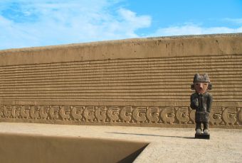 Adobe walls and carvings at the Chan Chan archaeological site
