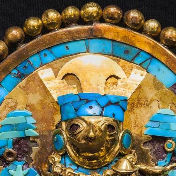 Close-up of a gold and turquoise pectoral from the Lord of Sipán’s treasure