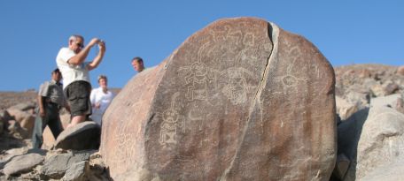 Tourists visiting the Petroglyphs of Chicchitara in Palpa Valley.