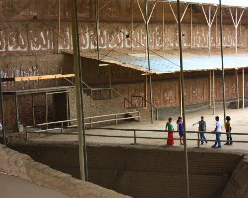 Visitors touring the interior of the Moche Temples.
