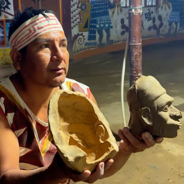 Moche descendant artisan demonstrating ancient pottery techniques
