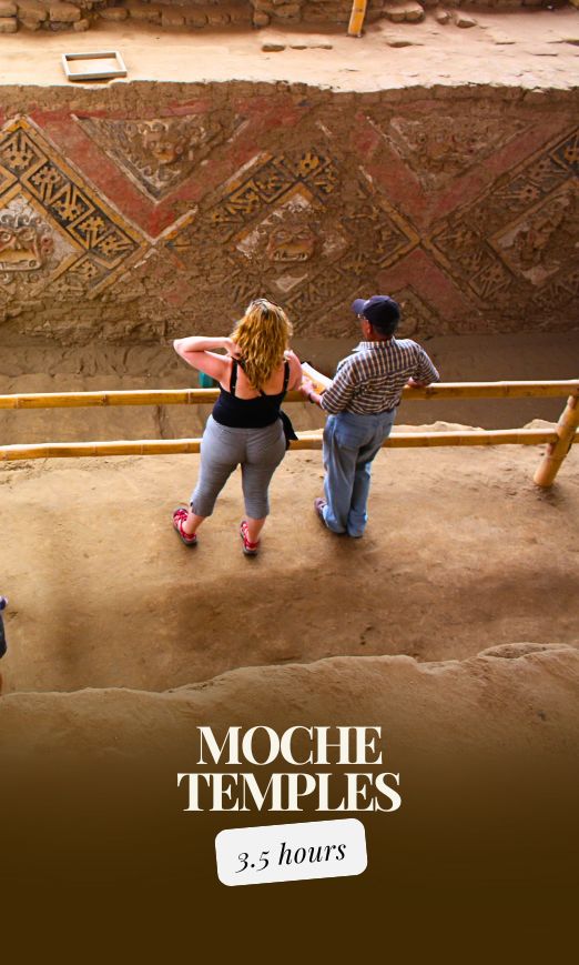 Visitors observing colorful Moche murals at the Moon Temple