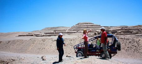 Dune buggy stop at Cahuachi Pyramids during the Usaka Desert Tour