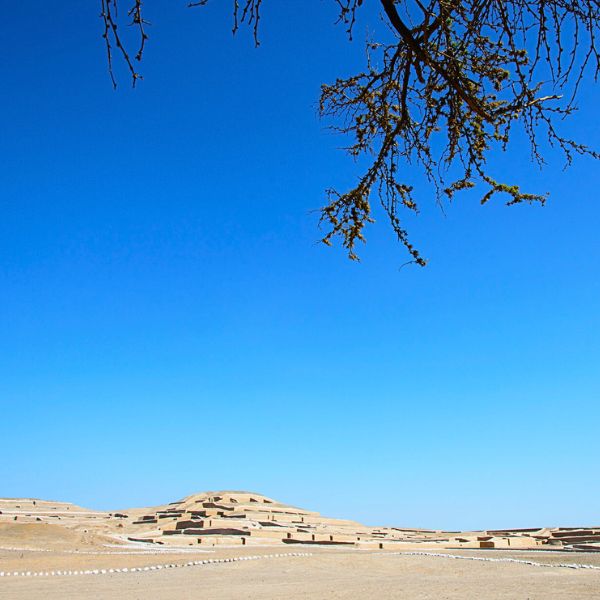 Panoramic view of Cahuachi Pyramids under a clear blue sky
